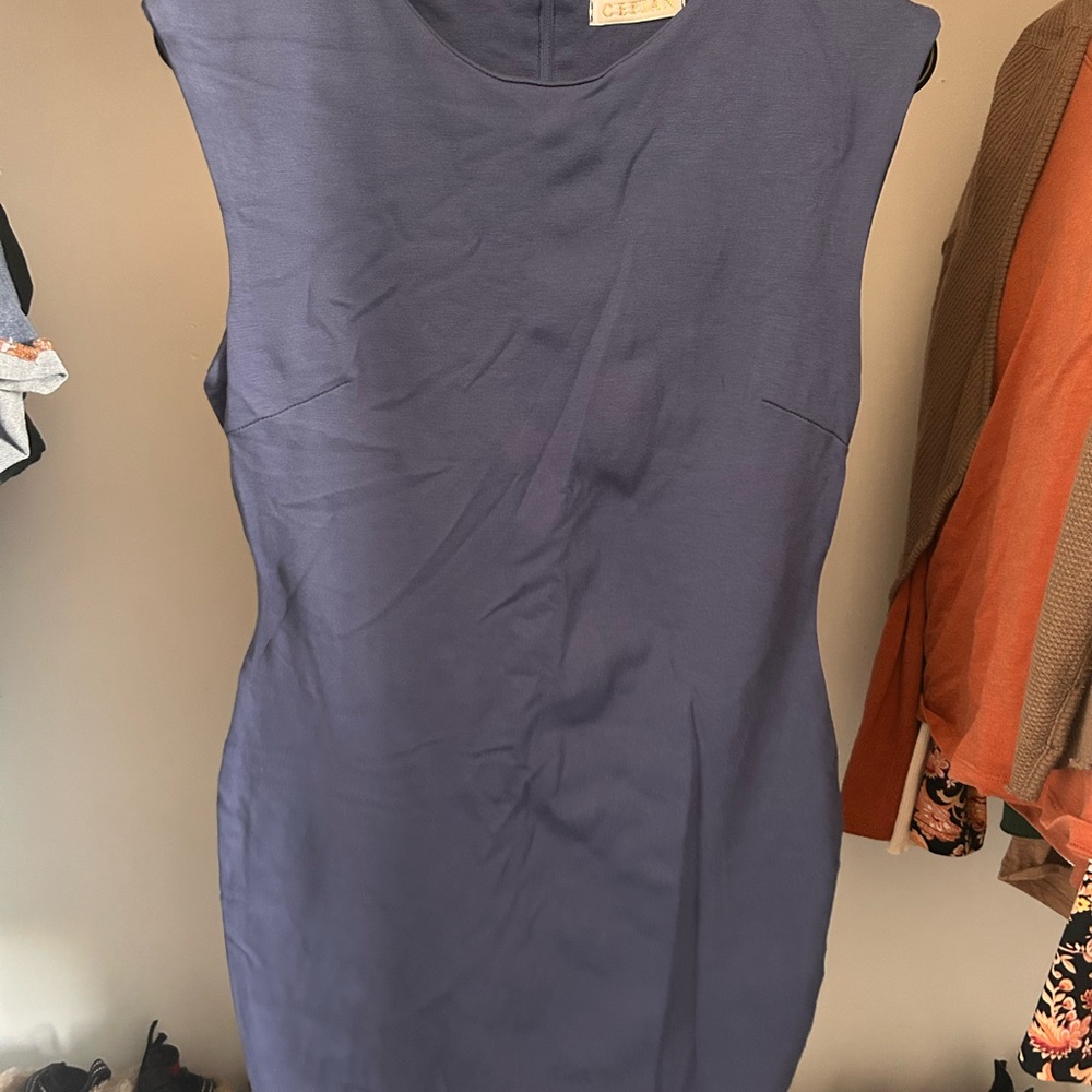 Cute little office dress. Makes ya booty pop!